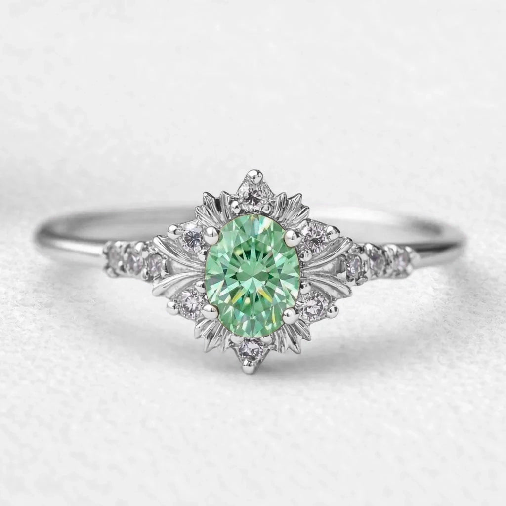 Isolde’s Enchantment | Vintage Oval Green Sapphire Halo Engagement Ring