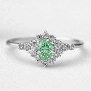 Isolde’s Enchantment | Vintage Oval Green Sapphire Halo Engagement Ring
