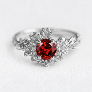 Isadora’s Crimson | Round Garnet Solitaire Petal Engagement Ring