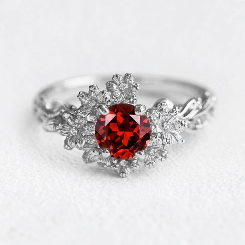 Isadora’s Crimson | Round Garnet Solitaire Petal Engagement Ring