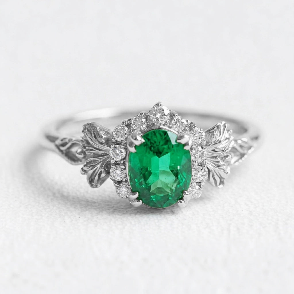 Isolde’s Halo | Rectangular Natural Emerald Engagement Ring with Diamond Halo.
