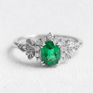 Isolde’s Halo | Rectangular Natural Emerald Engagement Ring with Diamond Halo.