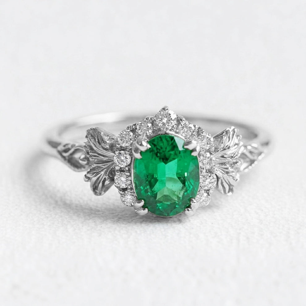 Isolde’s Halo | Rectangular Natural Emerald Engagement Ring with Diamond Halo.