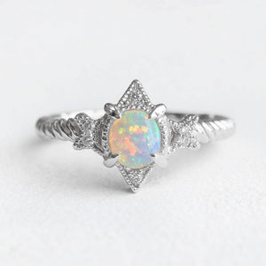 Aurora’s Lattice | Oval Opal Engagement Ring with Lozenge Weave Setting
