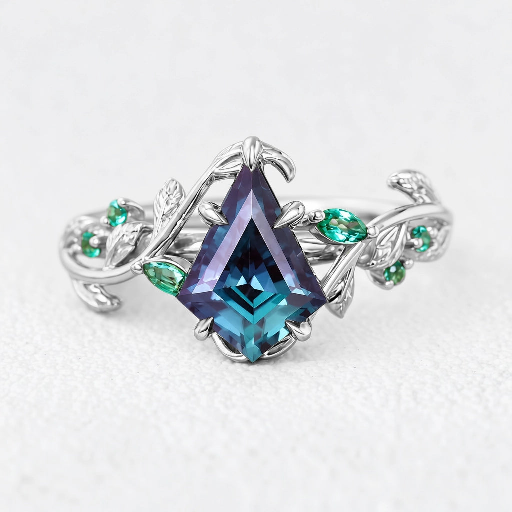Celestine’s Mirage | Kite Alexandrite with Emerald Foliage Engagement Ring
