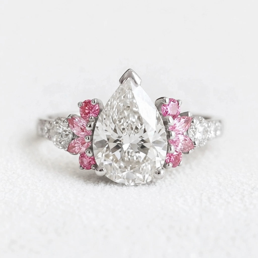 Vivienne’s Soar | 3CT Pear Diamond Engagement Ring with Marquise Accents.