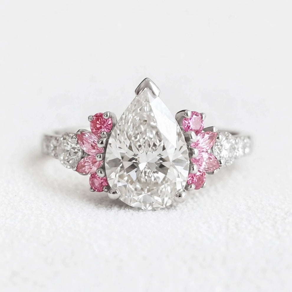 Vivienne’s Soar | 3CT Pear Diamond Engagement Ring with Marquise Accents.
