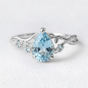 Athena’s Serenity | Pear Cut Blue Aquamarine Engagement Ring.