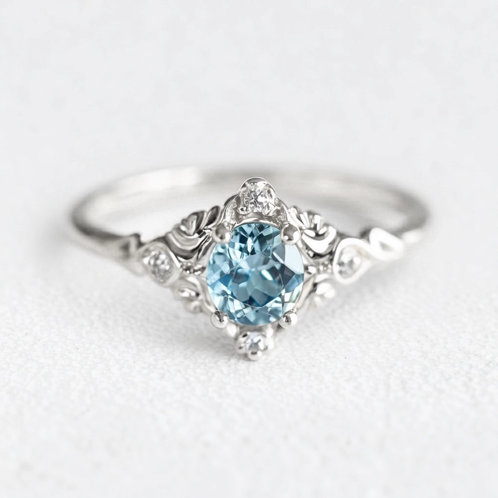 Marina’s Lace | Round Aquamarine Engagement Ring with Filigree Setting.