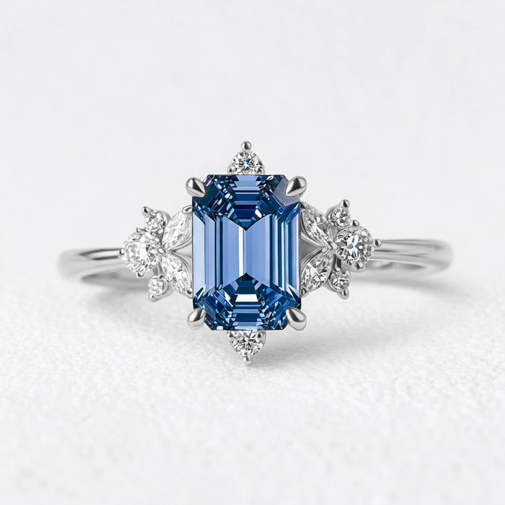 Lyra’s Cadence | 2CT Vintage Emerald Cut Blue Sapphire Ring.