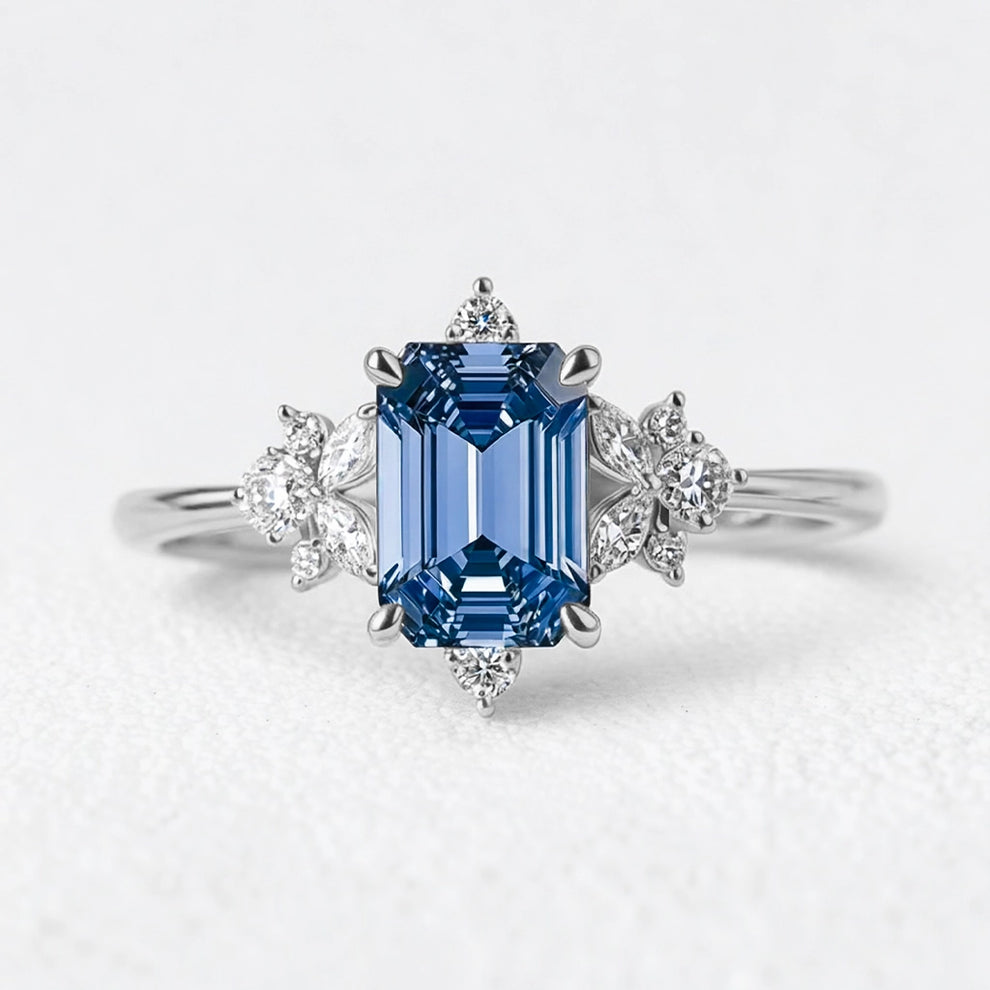 Lyra’s Cadence | 2CT Vintage Emerald Cut Blue Sapphire Ring.