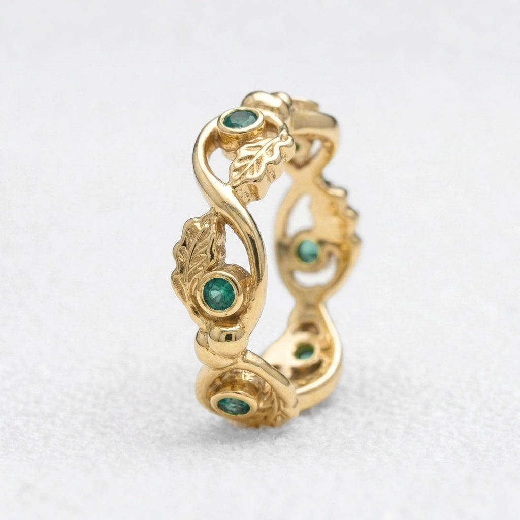 The Lacy Oak | Openwork Oak Leaves & Natural Emerald Women's Wedding Band.