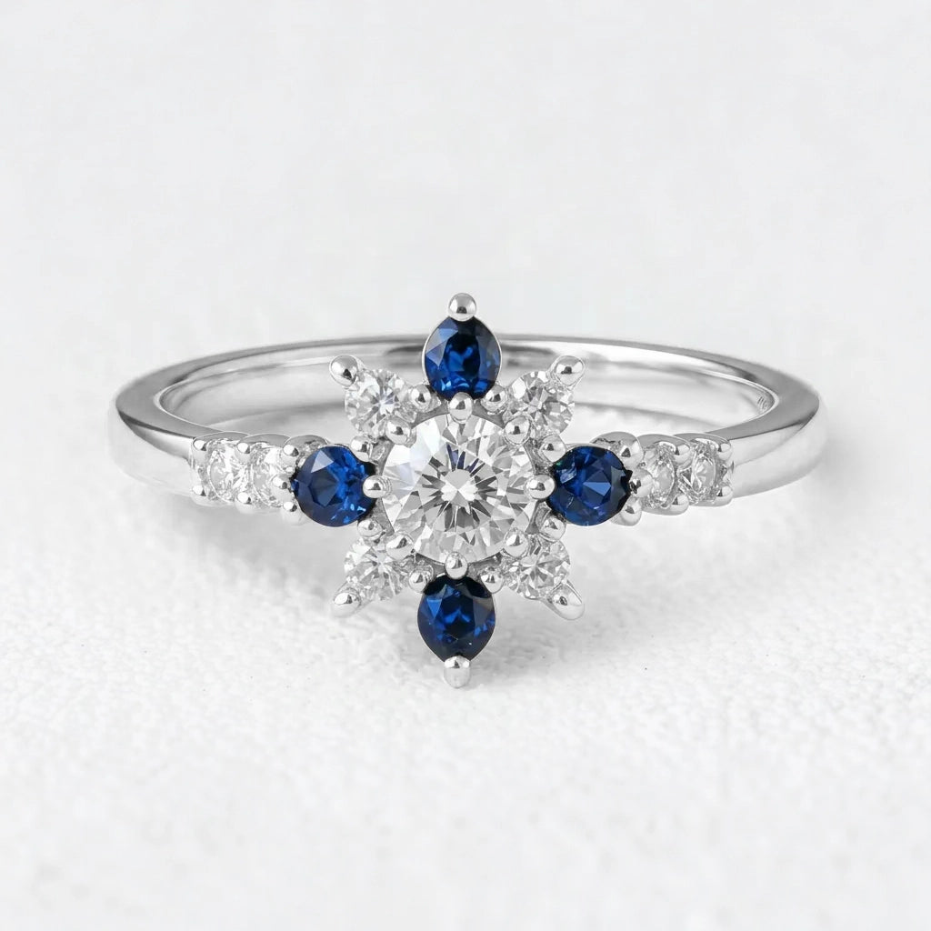 Sylvia’s Bloom | Round Diamond & Sapphire Petal Engagement Ring