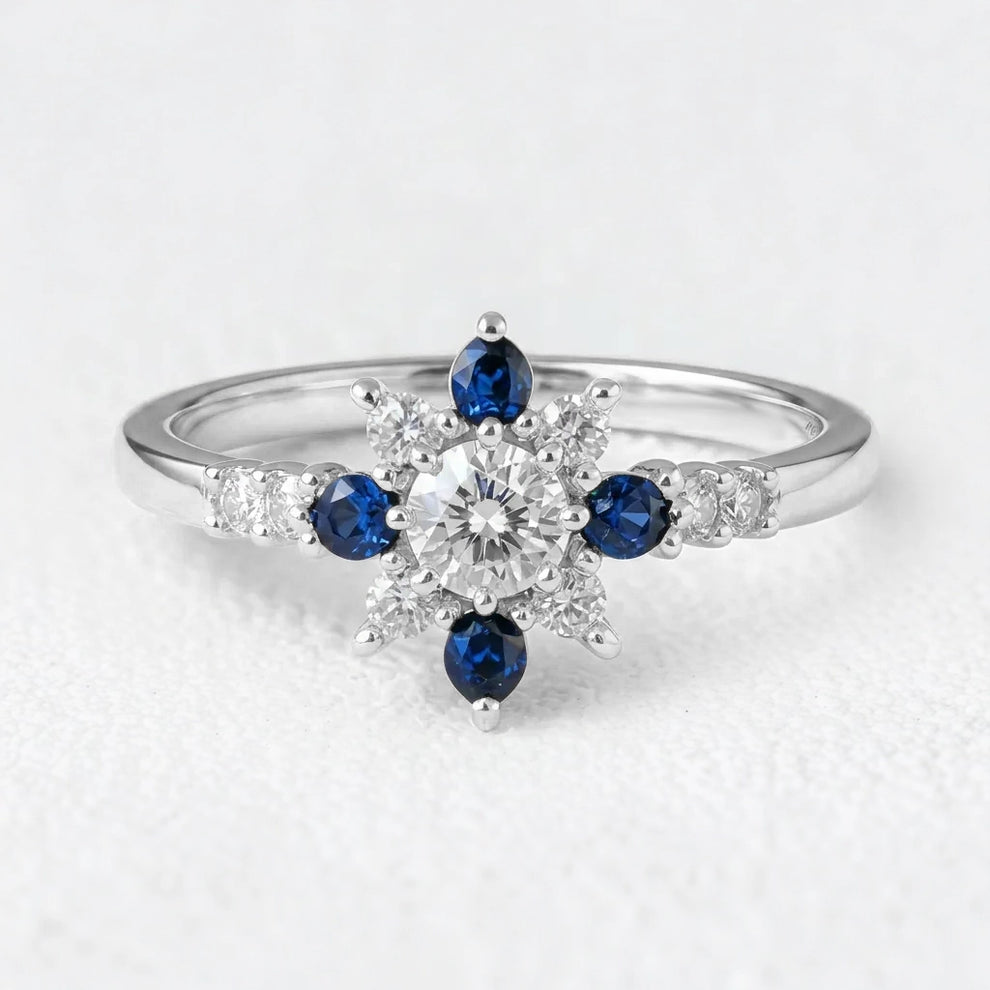 Sylvia’s Bloom | Round Diamond & Sapphire Petal Engagement Ring