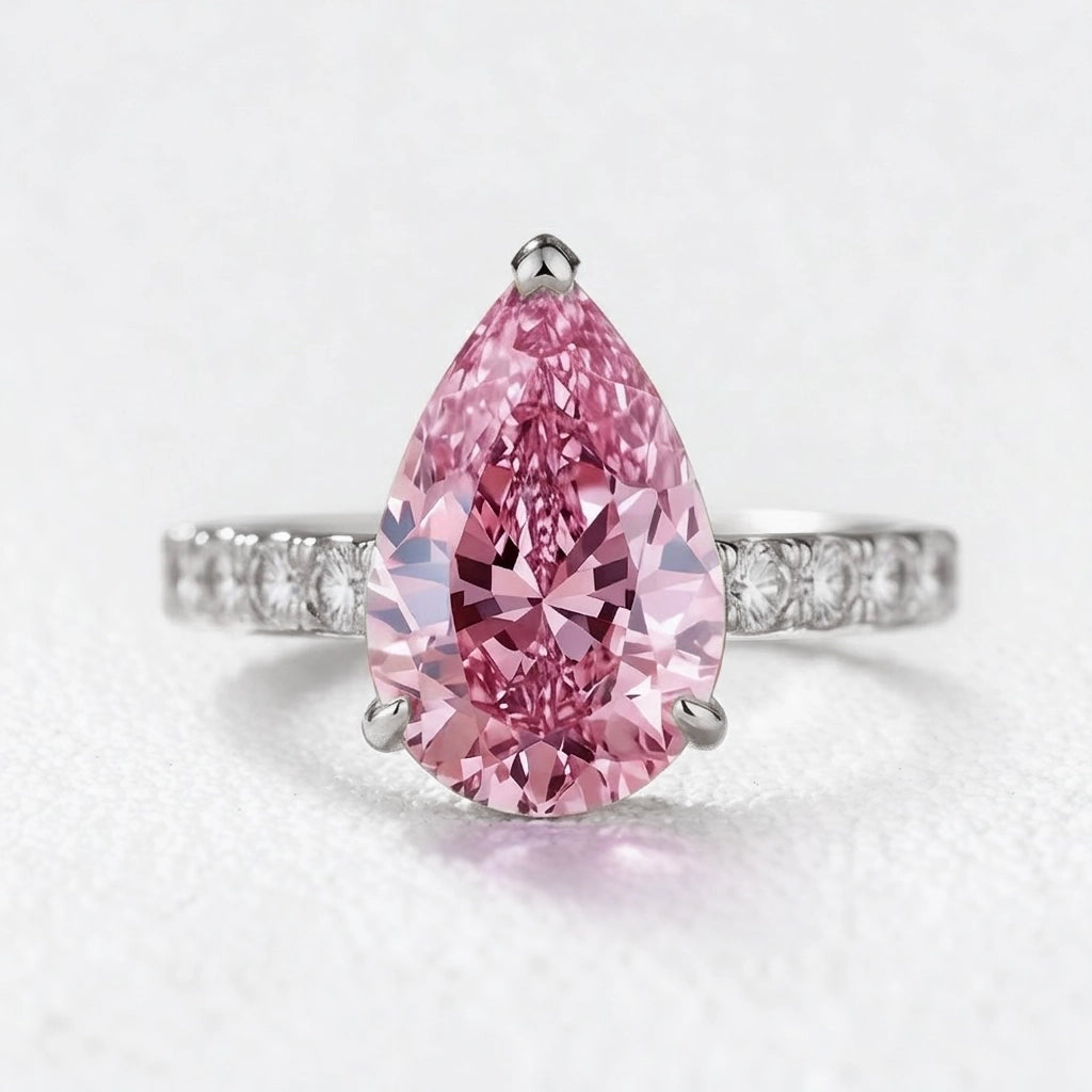Aurora’s Promise | 3CT Pear Cut Pink Sapphire Solitaire Engagement Ring