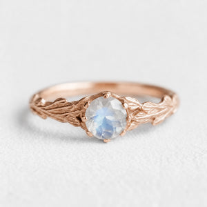 Athena’s Wings | Round Moonstone Olive Branch Engagement Ring.