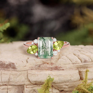 Nature Inspired Emerald Cut Moss Agate Double Pear Peridot Engagement Ring.