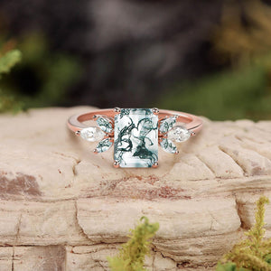Aethra’s Pinions | Emerald Cut Moss Agate Cluster Wing Engagement Ring.