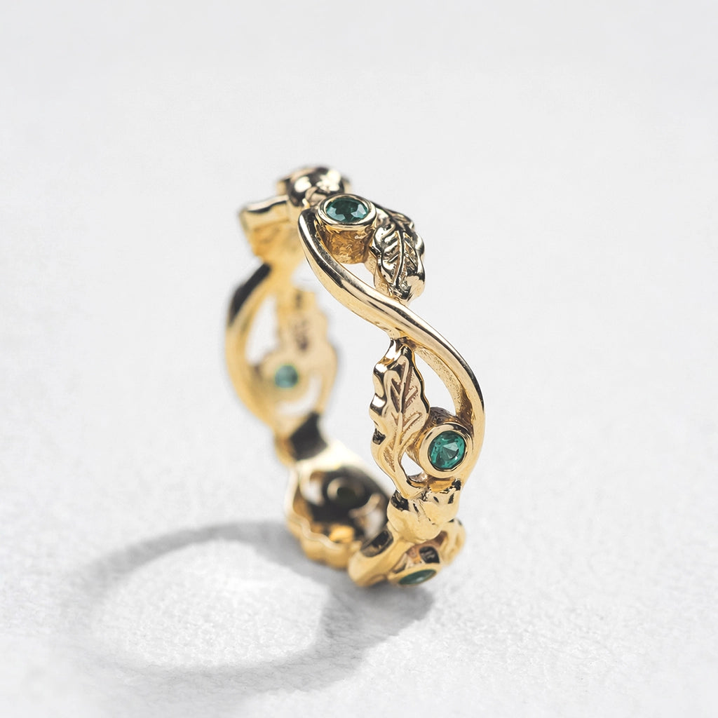 The Lacy Oak | Openwork Oak Leaves & Natural Emerald Women's Wedding Band.
