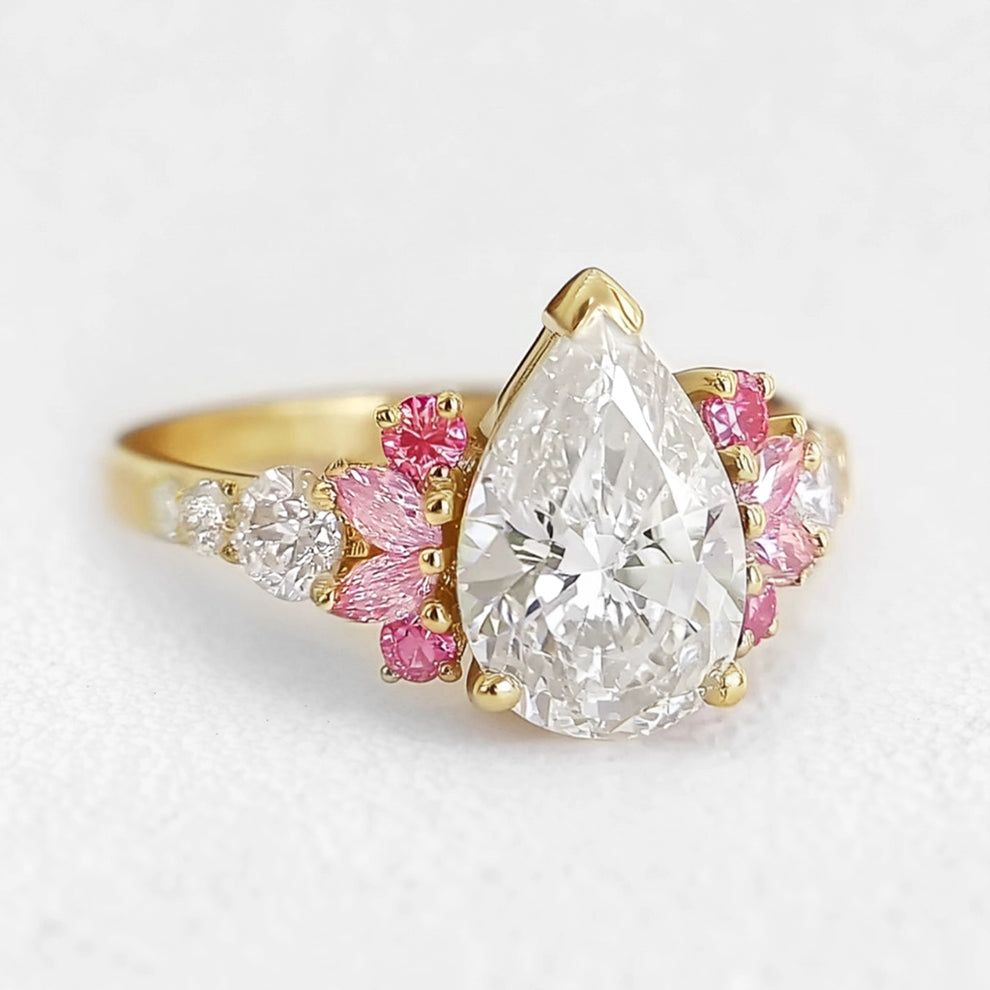 Vivienne’s Soar | 3CT Pear Diamond Engagement Ring with Marquise Accents.