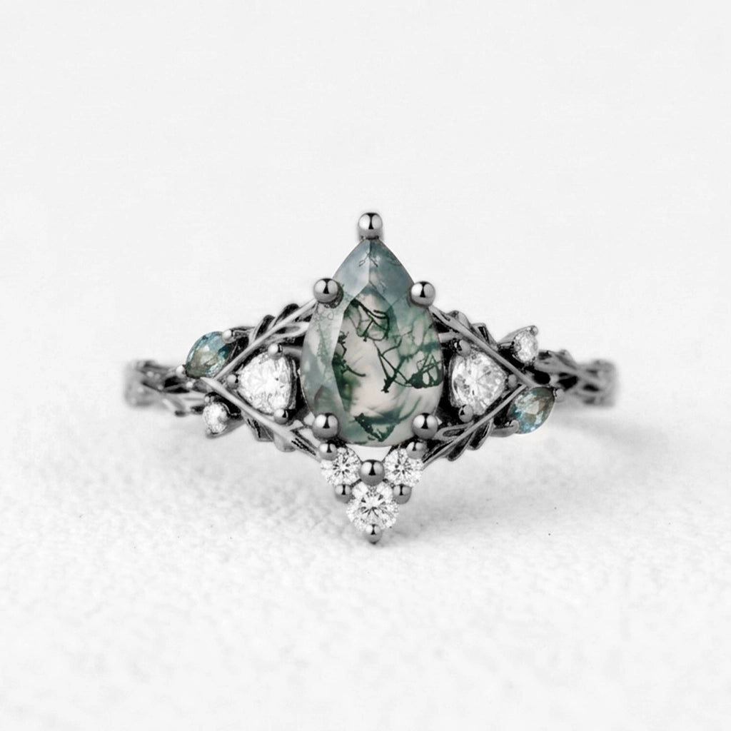Katriel Pear Cut Lab Moss Agate Oak Leaf Engagement Ring.