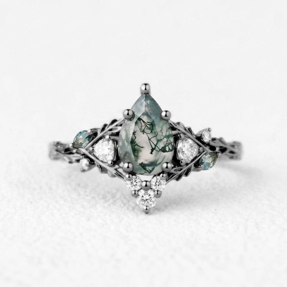 Katriel Pear Cut Lab Moss Agate Oak Leaf Engagement Ring.