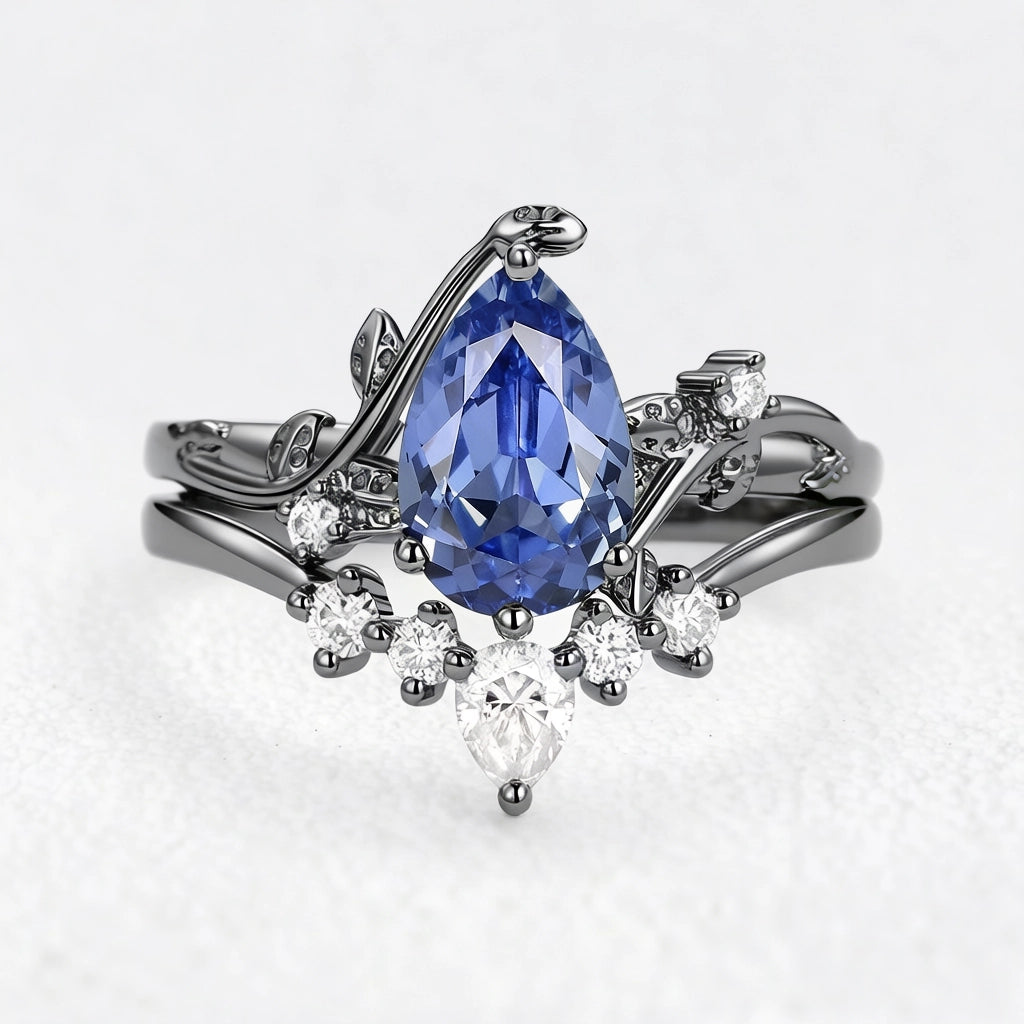 Eleonora’s Mirage | 1.5CT Pear Cut Tanzanite Foliage Bridal Duo