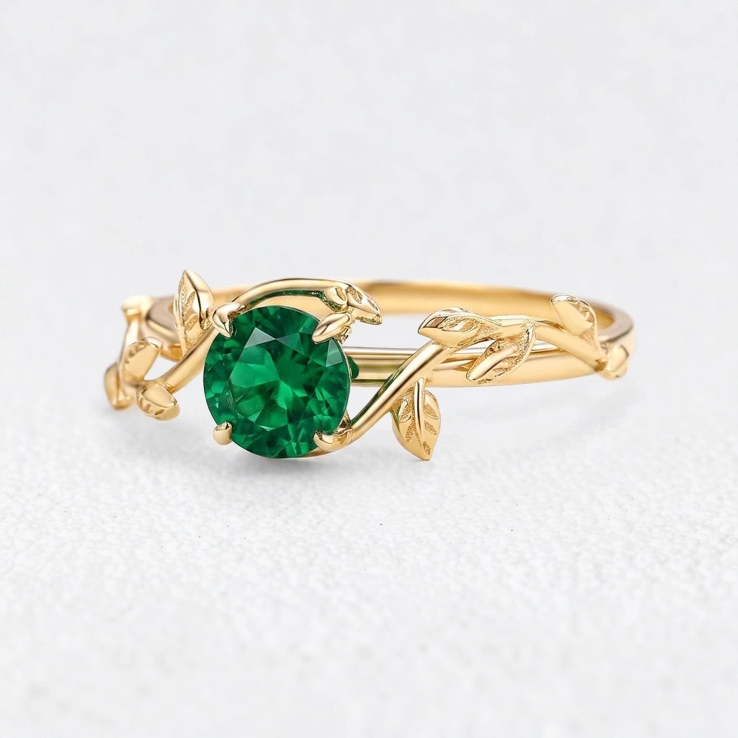 Isadora’s Eden | Round Emerald Foliage Engagement Ring