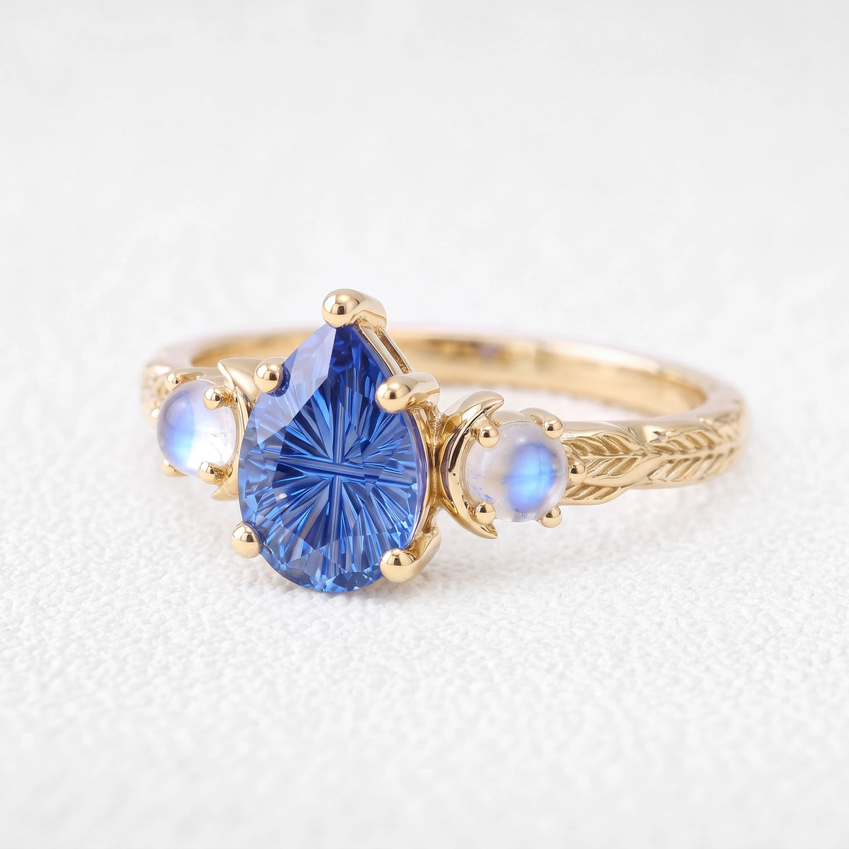 Asteria’s Moonveil | Pear Fantasy-Cut Royal Blue Sapphire & Moonstone Filigree Engagement Ring