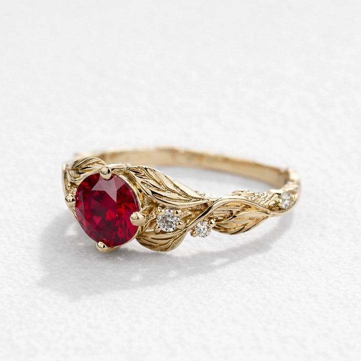 Rosalind’s Olive | Round Ruby Solitaire Ring with Olive Leaf Diamond Accents.