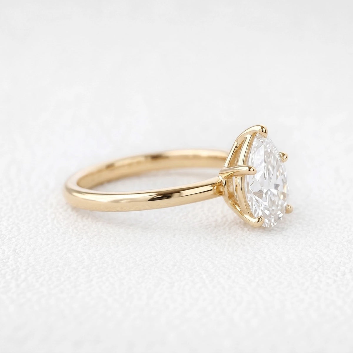 1.0ct Pear Shaped Moissanite Classic Solitaire Ring