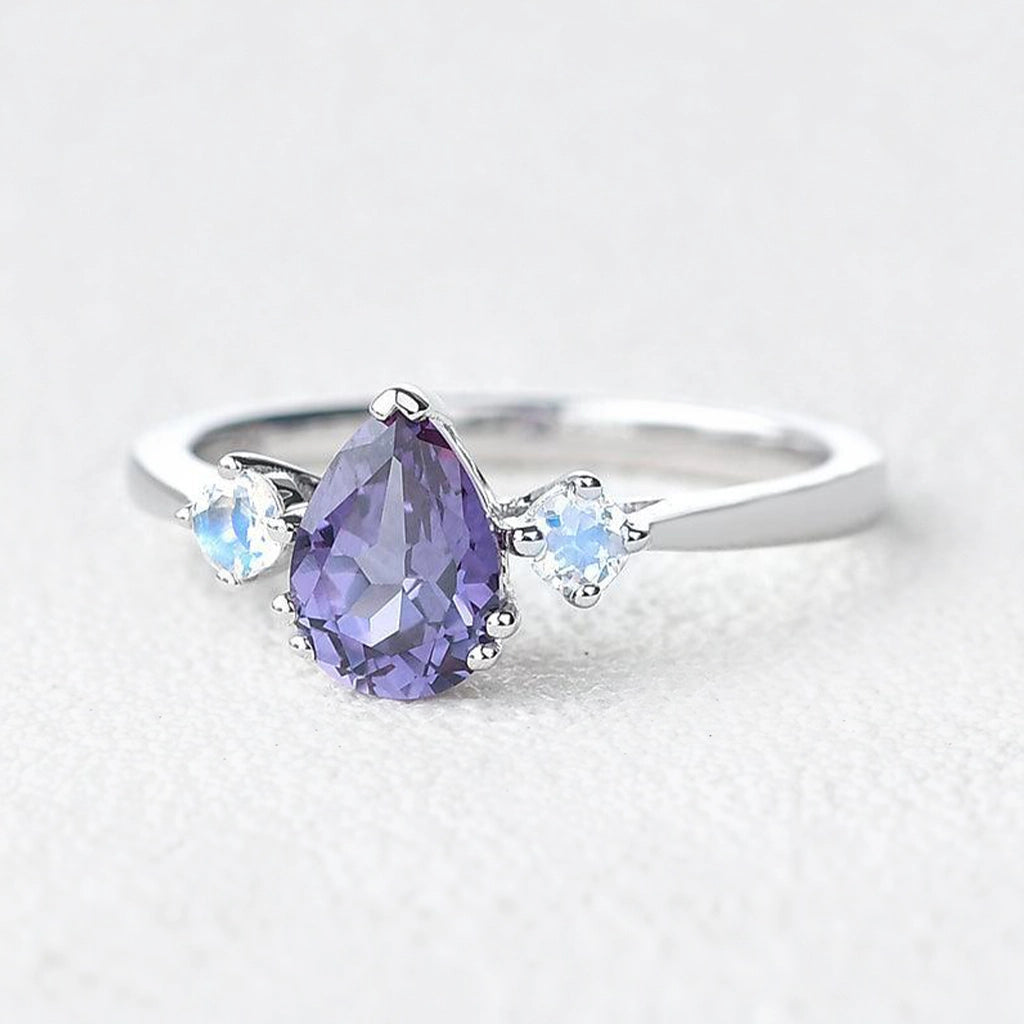 Selene’s Mirage | Pear Tanzanite & Moonstone Engagement Ring