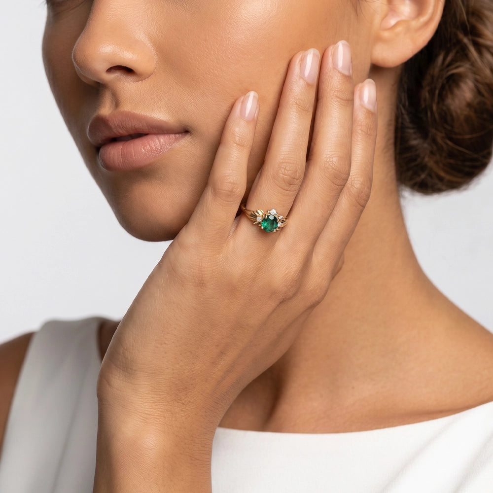 Eve’s Laurel | Natural Emerald Engagement Ring with Diamond Leaf Setting.