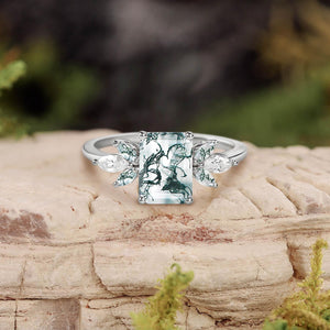 Aethra’s Pinions | Emerald Cut Moss Agate Cluster Wing Engagement Ring.