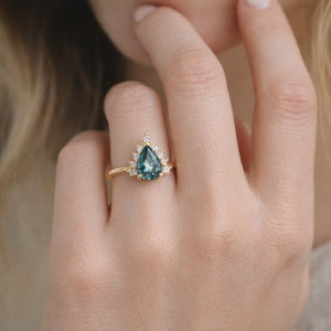 Mermaid’s Crown | Pear Teal Sapphire Halo Engagement Ring.