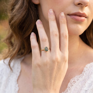 Cordelia’s Pavilion | Emerald Cut Moss Agate Solitaire Engagement Ring