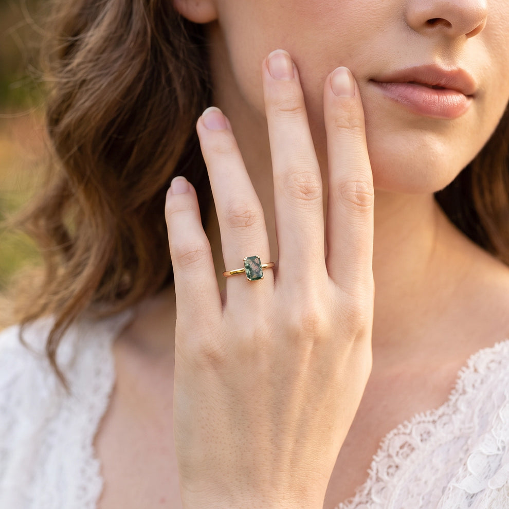 Cordelia’s Pavilion | Emerald Cut Moss Agate Solitaire Engagement Ring