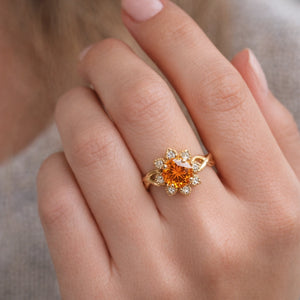 Ivy’s Corolla | Round Orange Garnet Engagement Ring with Petal Halo