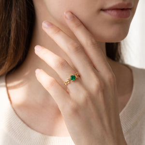 Isadora’s Eden | Round Emerald Foliage Engagement Ring