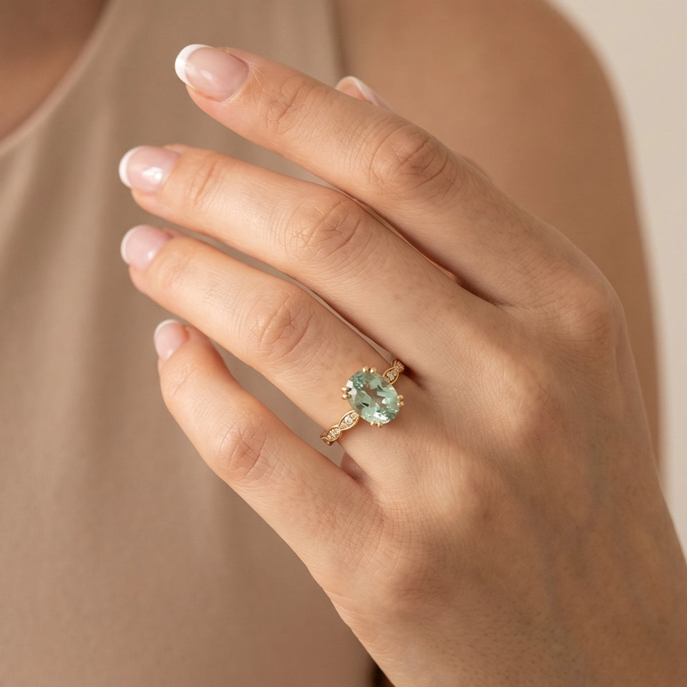 Lydia's Lace | 2CT Oval Green Sapphire Engagement Ring with Lace-Trim Diamond Band.