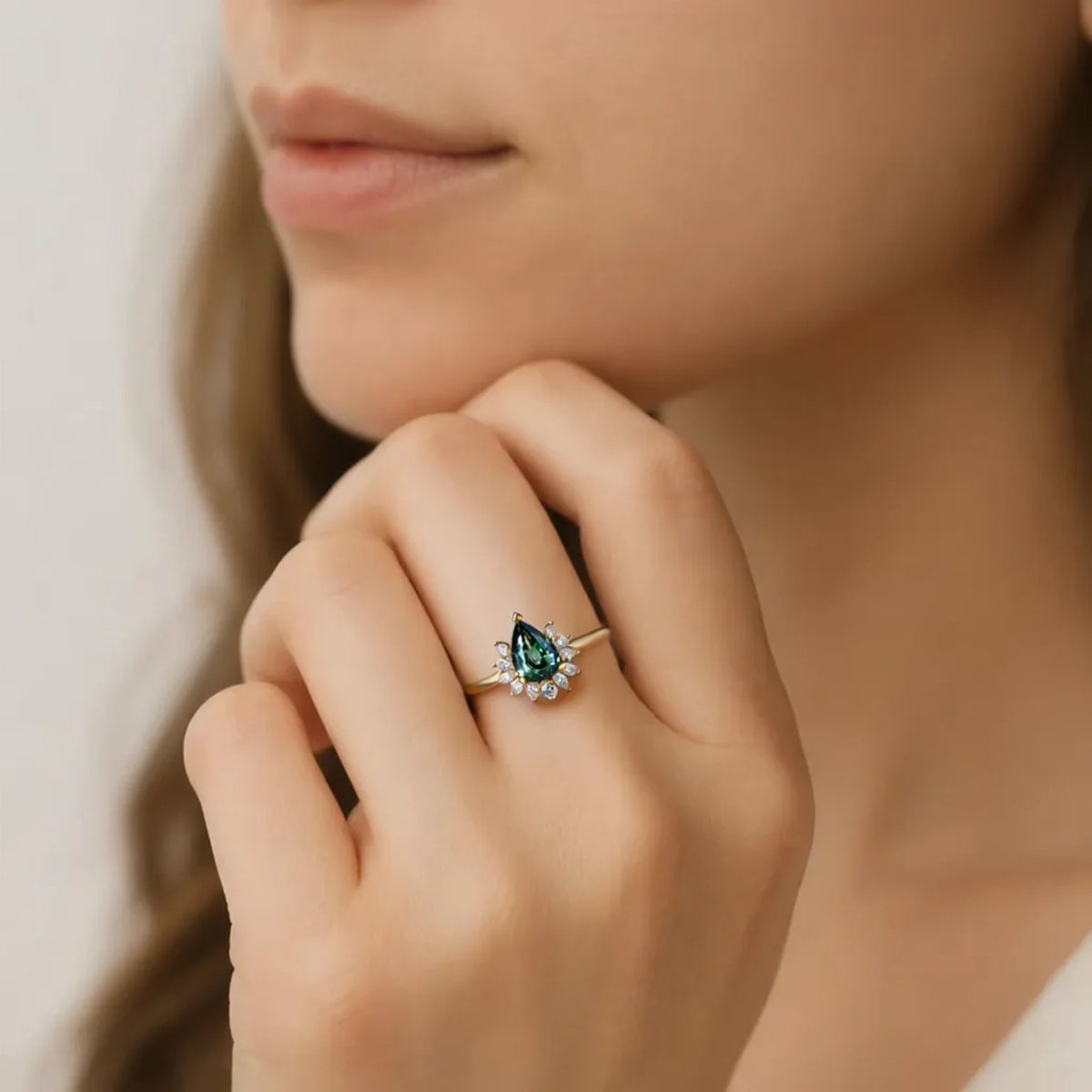 Lyra’s Hearth | Pear Teal Sapphire Engagement Ring.