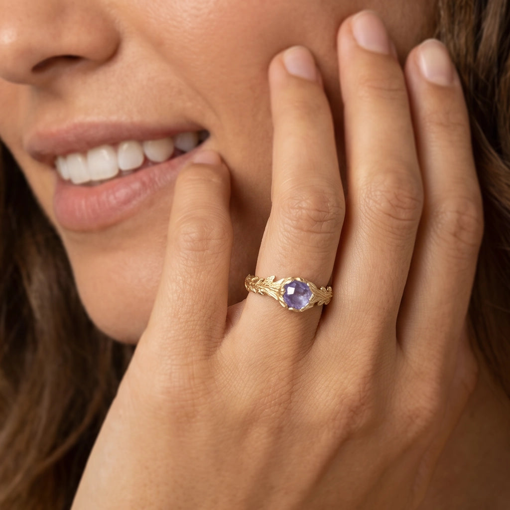 Daphne’s Branch | Round Tanzanite Engagement Ring with Sculptural Vine Band.