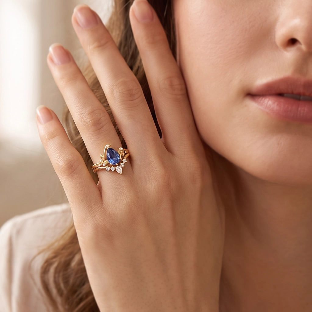 Eleonora’s Mirage | 1.5CT Pear Cut Tanzanite Foliage Bridal Duo