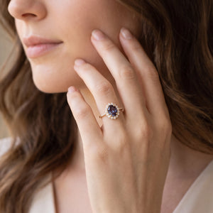 Theodora's Mirage | Oval-Cut Blue Alexandrite Halo Engagement Ring