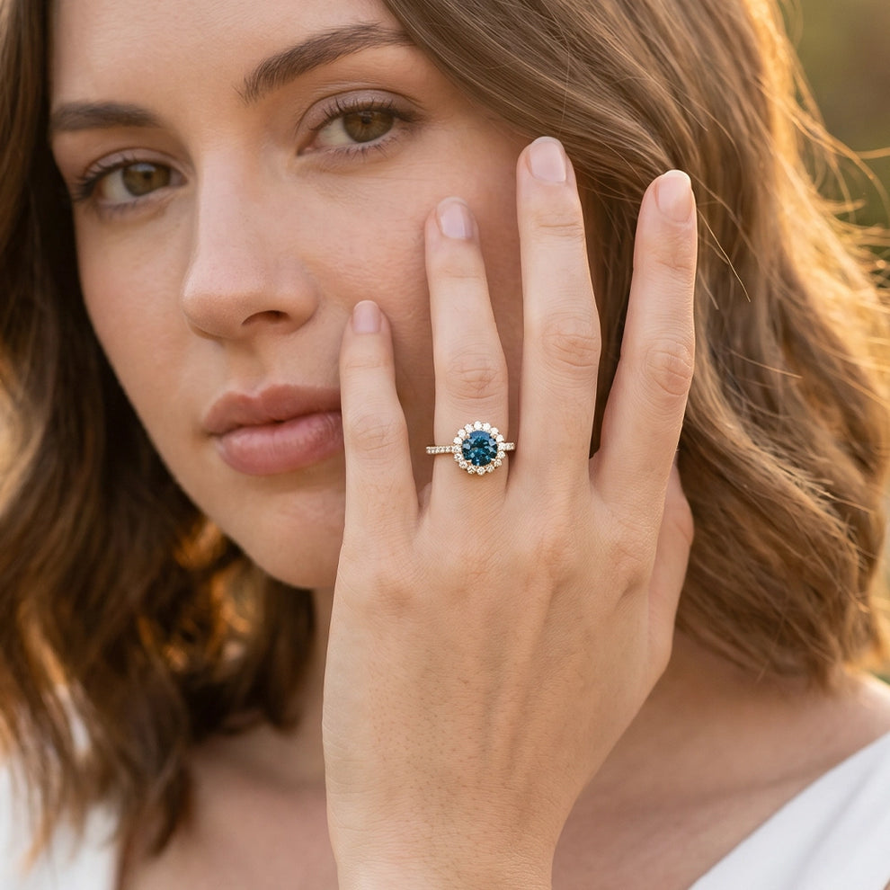 Stella's Spark | Vintage Blue Sapphire Diamond Halo Engagement Ring.