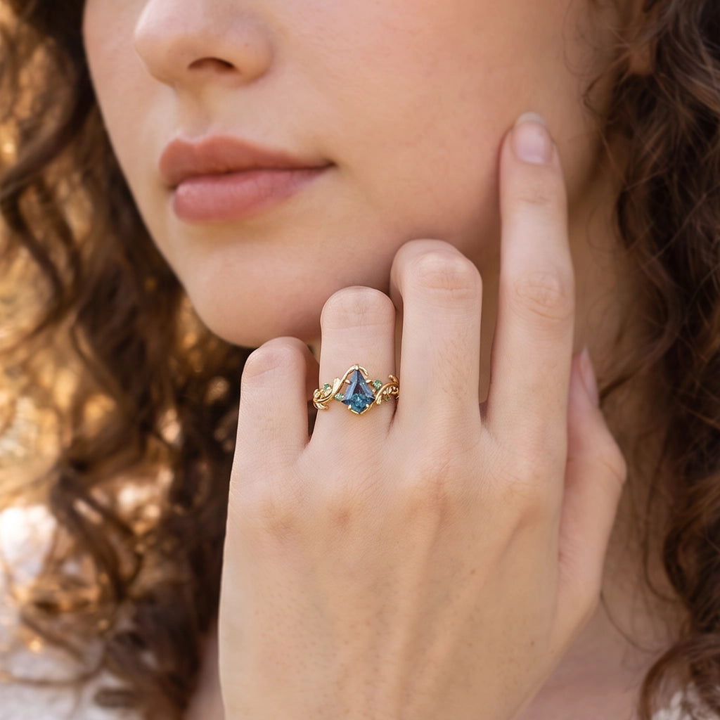 Celestine’s Mirage | Kite Alexandrite with Emerald Foliage Engagement Ring