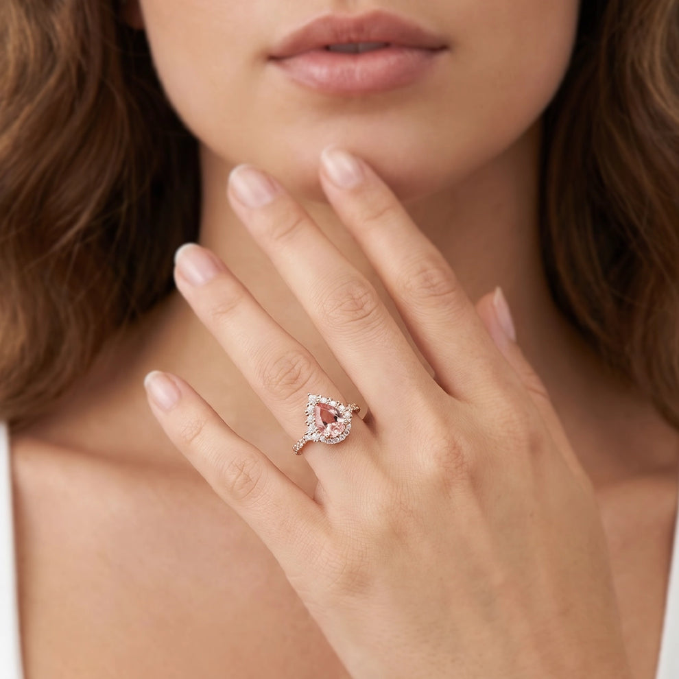 Aurora’s Promise |  Pear Cut Pink Sapphire Halo Engagement Ring.
