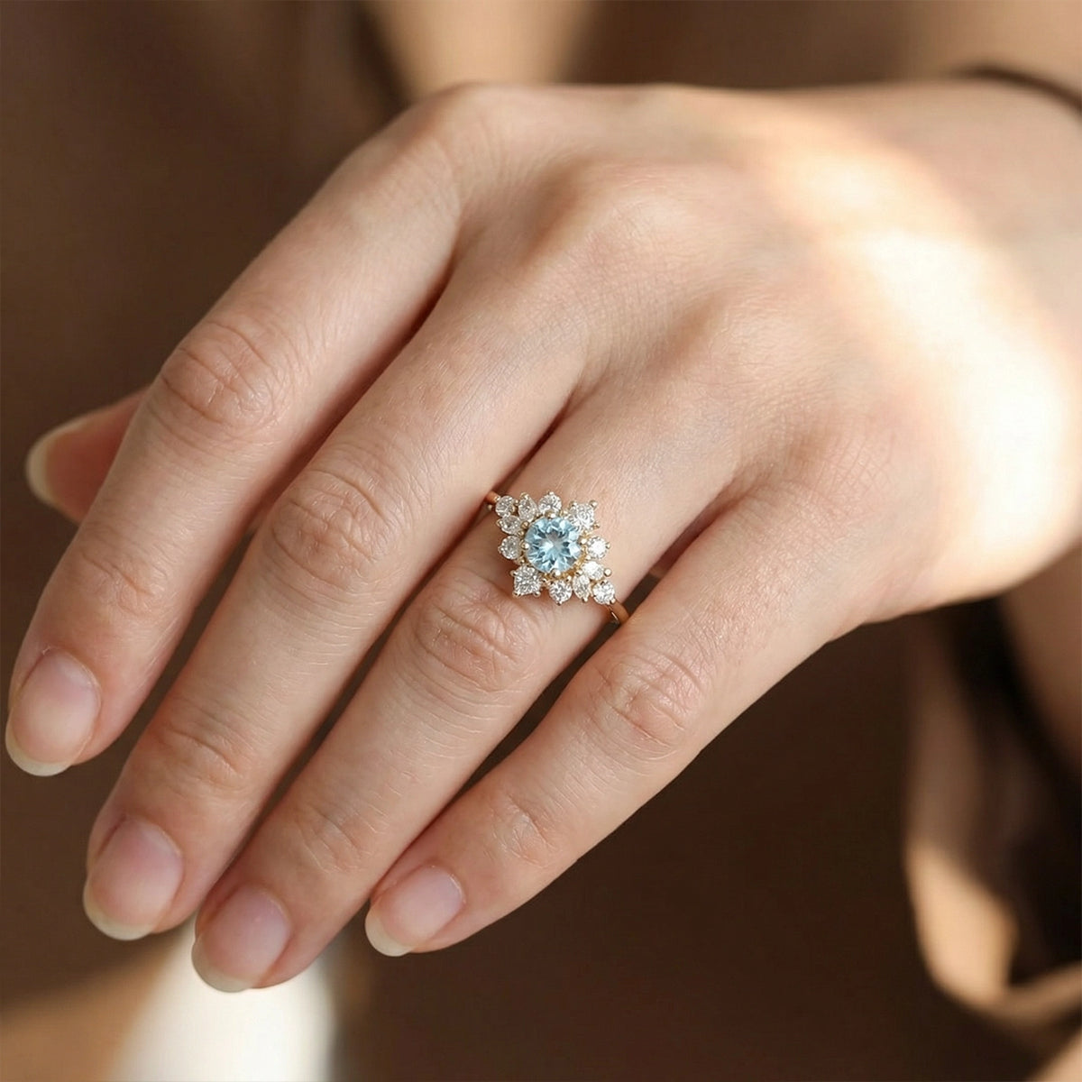 Marina's Blossom | Round Cut Aquamarine Engagement Ring With Pear Moissanite Petals.