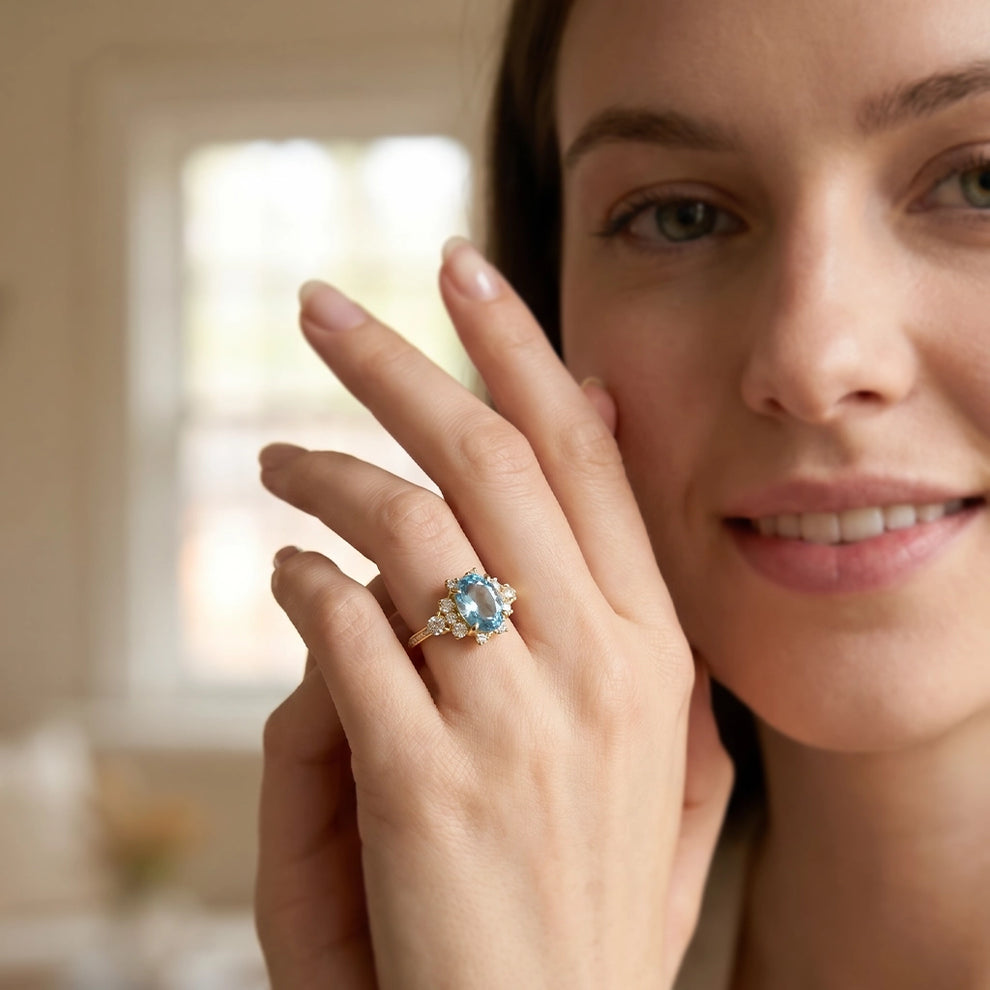 Aria‘s Bay | Oval Cut Blue Topaz Halo Engagement Ring.