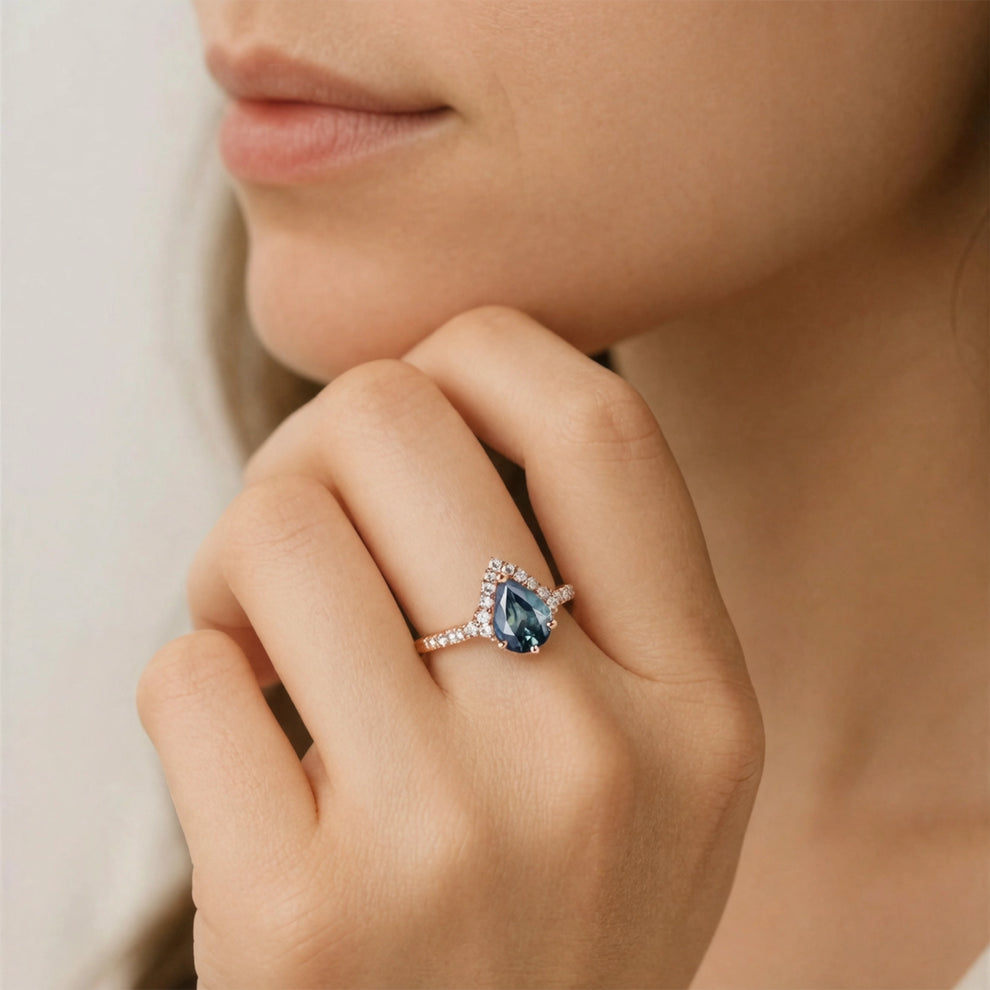 Aurora’s Teardrop | Pear Blue Sapphire Half-Halo Ring.